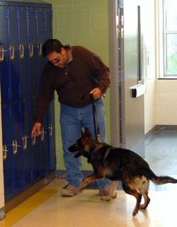 Handled by Jim Tortorella, Luca searches school locker